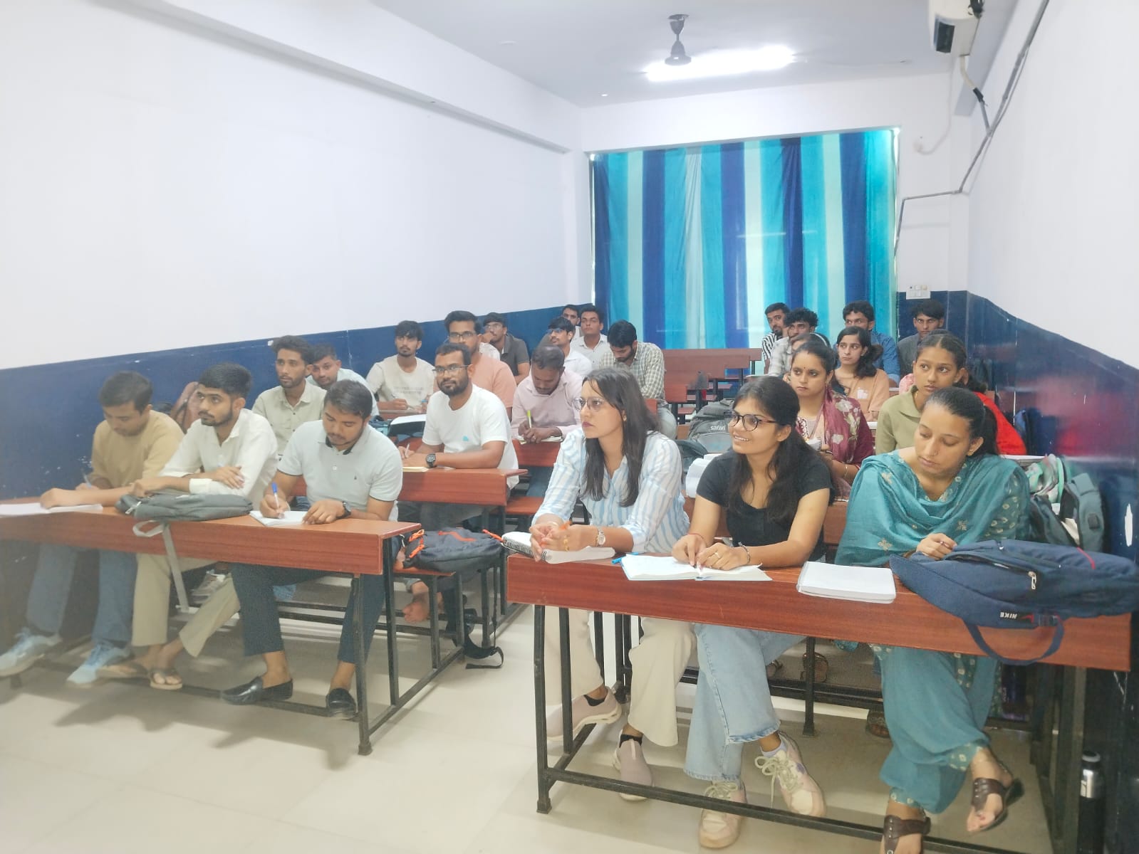 Students studying in a Selection Campus classroom